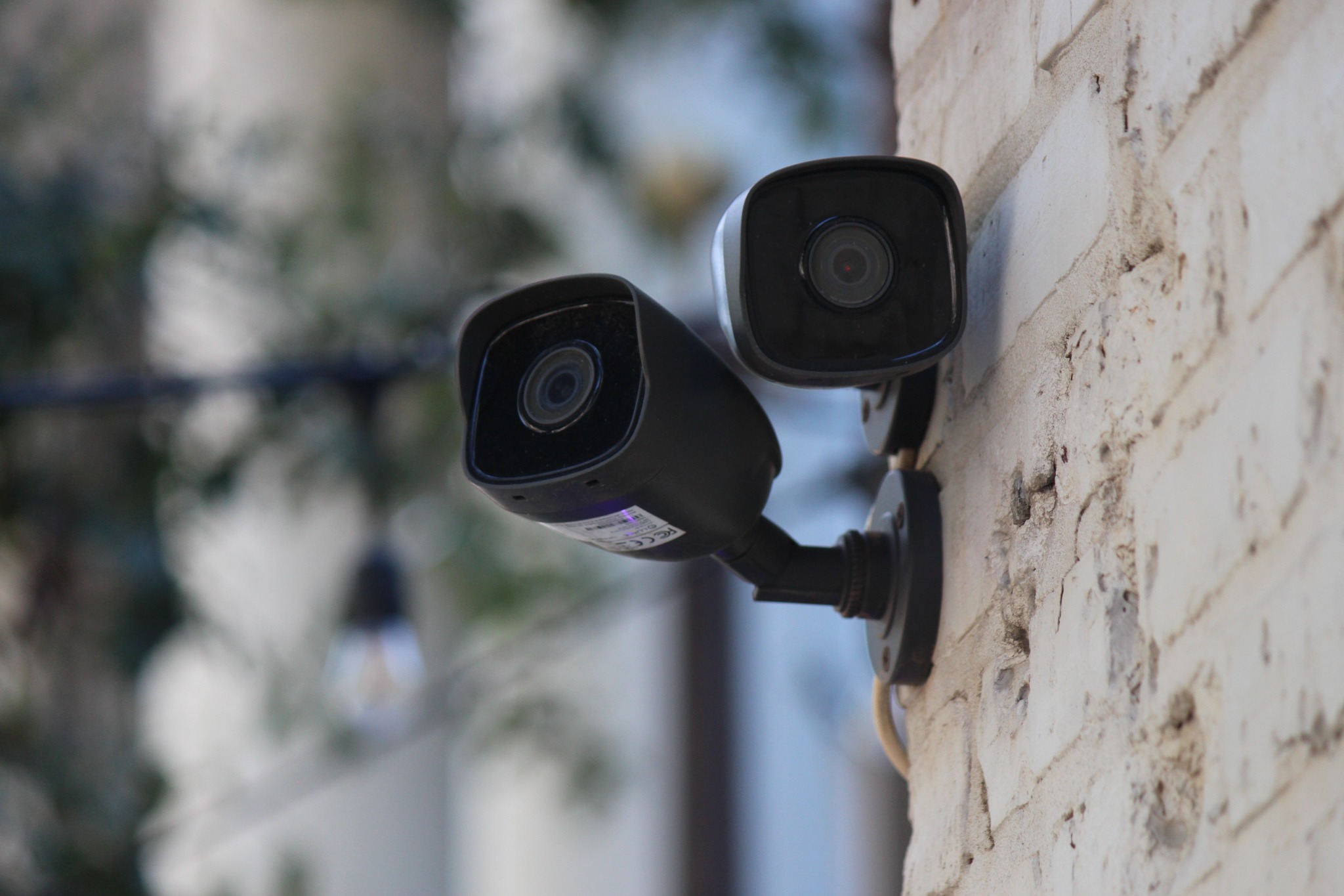 Outdoor security cameras on building